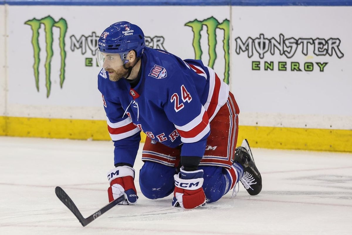 Jan 14, 2026; New York, New York, USA;  New York Rangers defenseman Carson Soucy (24) falls to the ice after getting injured in the second period against the Ottawa Senators at Madison Square Garden. Mandatory Credit: Wendell Cruz-Imagn Images