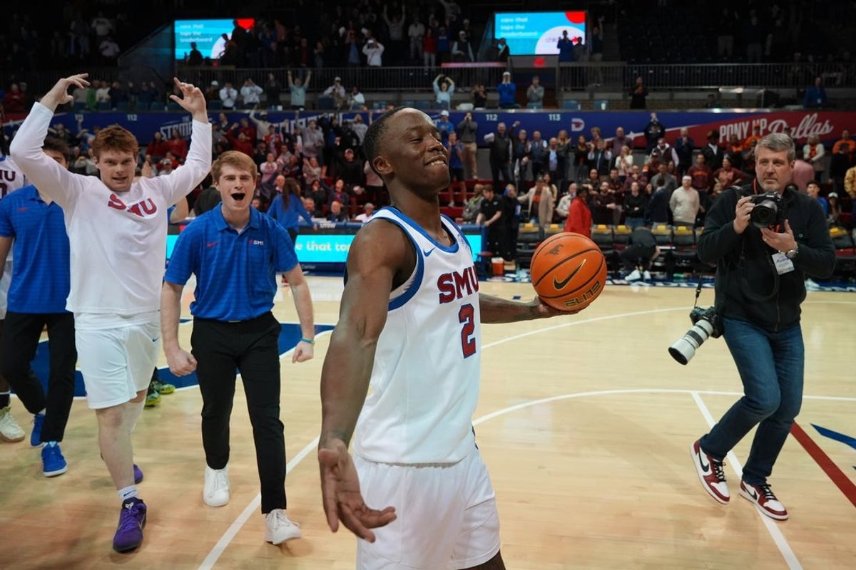 Jan 14, 2026; Dallas, Texas, USA;  SMU Mustangs guard Boopie Miller (2) reacts after making the a game winning half court shot against the Virginia Tech Hokies at Moody Coliseum. Mandatory Credit: Raymond Carlin III-Imagn Images