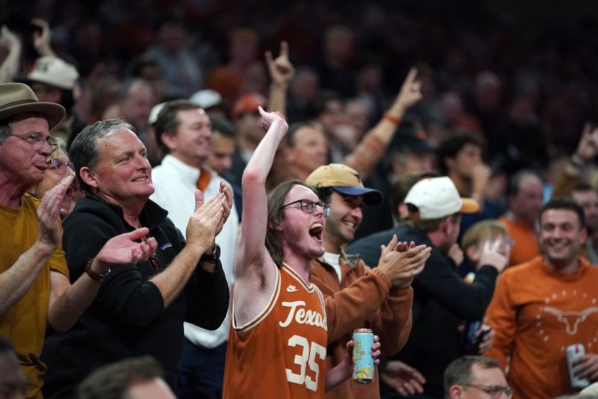 Jan 14, 2026; Austin, Texas, USA; Texas Longhorns fans celebrate a 20 point lead against the Vanderbilt Commodores during the second half at Moody Center. Mandatory Credit: Dustin Safranek-Imagn Images