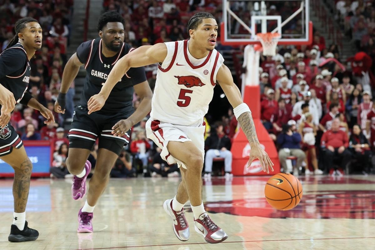 Jan 14, 2026; Fayetteville, Arkansas, USA; Arkansas Razorbacks guard Darius Acuff Jr (5) drives against the South Carolina Gamecocks during the first half at Bud Walton Arena. Arkansas won 108-74. Mandatory Credit: Nelson Chenault-Imagn Images