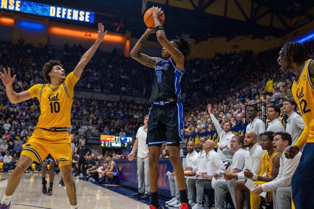 Jan 14, 2026; Berkeley, California, USA; Duke Blue Devils guard Isaiah Evans (3) makes a three point shot against California Golden Bears guard Justin Pippen (10) during the first half at Haas Pavilion. Mandatory Credit: Neville E. Guard-Imagn Images