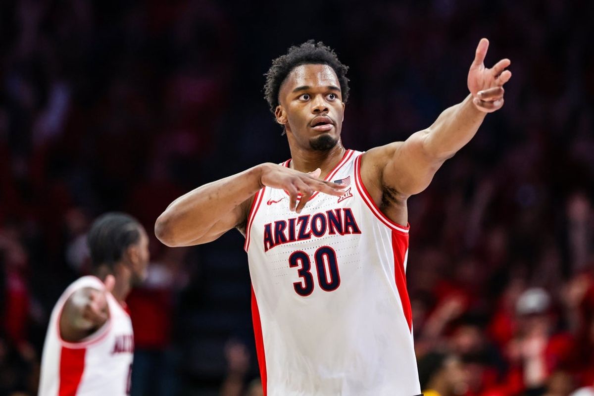 Jan 14, 2026; Tucson, Arizona, USA; Arizona Wildcats forward Tobe Awaka (30) reacts after he made a three point shot during the first half of the game against the Arizona State Sun Devils at McKale Memorial Center. Mandatory Credit: Aryanna Frank-Imagn Images