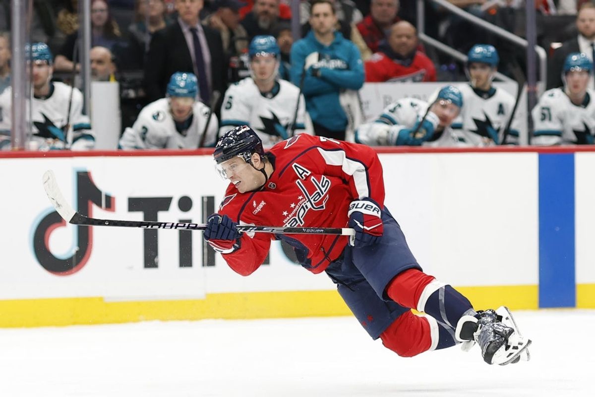 Jan 15, 2026; Washington, District of Columbia, USA; Washington Capitals defenseman John Carlson (74) shoots the puck against the San Jose Sharks during the third period at Capital One Arena. Mandatory Credit: Geoff Burke-Imagn Images
