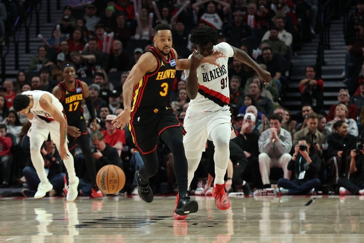 Jan 15, 2026; Portland, Oregon, USA;  Atlanta Hawks guard CJ McCollum (3) uses his hand to fend off Portland Trail Blazers guard Sidy Cissoko (91) during the second half at Moda Center. Mandatory Credit: Jaime Valdez-Imagn Images