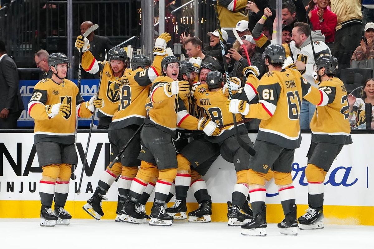 Jan 15, 2026; Las Vegas, Nevada, USA; Vegas Golden Knights center Jack Eichel (9) celebrates with team mates after scoring a goal against the Toronto Maple Leafs during an overtime period to give the Golden Knights a 6-5 victory at T-Mobile Arena. Mandatory Credit: Stephen R. Sylvanie-Imagn Images