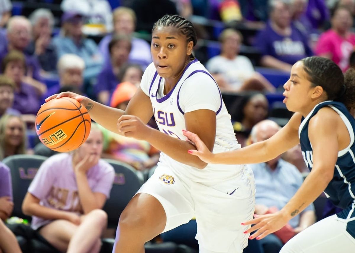 Mikaylah Williams (12) moves the ball as LSU Womens Basketball host East Texas Baptist. Thursday, Oct. 26, 2023.