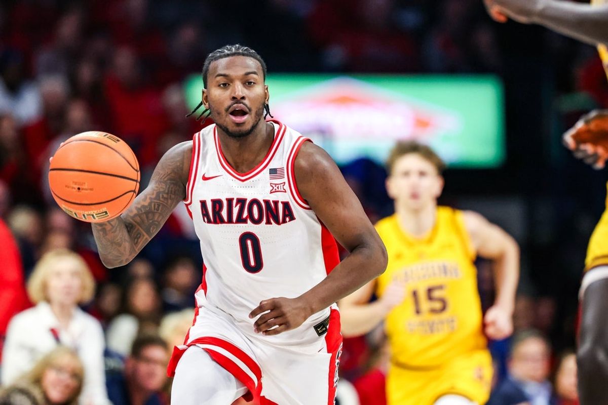 Jan 14, 2026; Tucson, Arizona, USA; Arizona Wildcats guard Jaden Bradley (0) dribbles the ball during the second half of the game against the Arizona State Sun Devils at McKale Memorial Center. Mandatory Credit: Aryanna Frank-Imagn Images