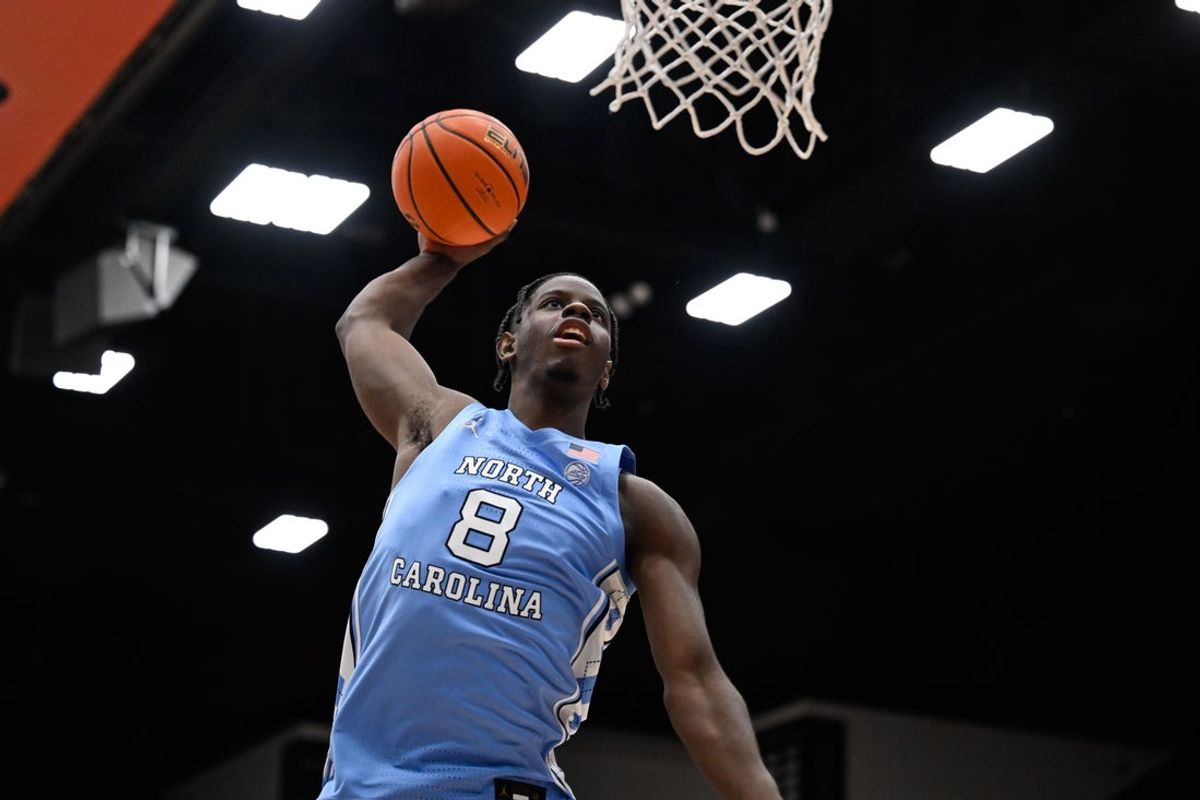 Jan 14, 2026; Stanford, California, USA; North Carolina Tar Heels forward Caleb Wilson (8) dunks during warm ups before the game against the Stanford Cardinal at Maples Pavilion. Mandatory Credit: Eakin Howard-Imagn Images