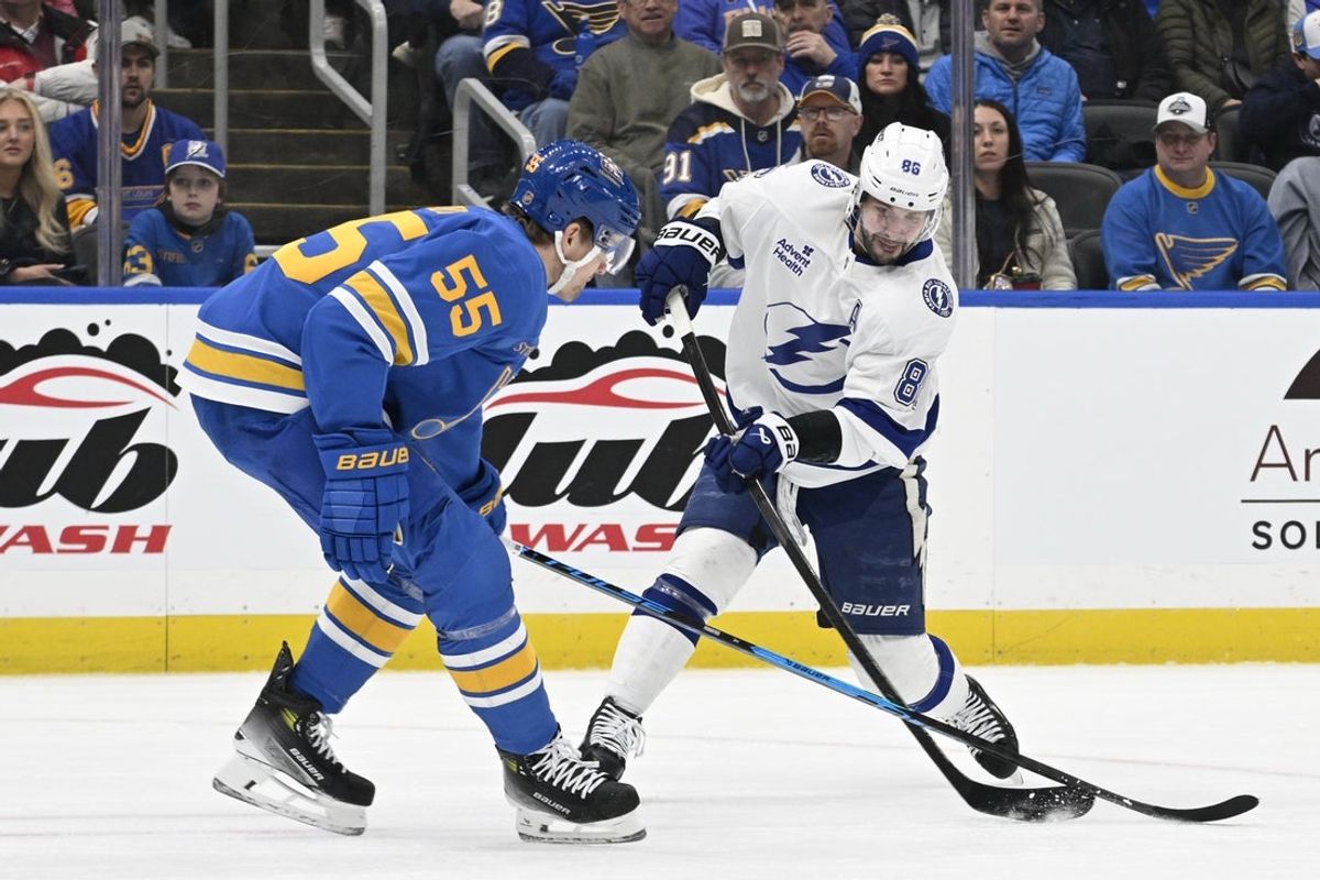 Jan 16, 2026; St. Louis, Missouri, USA; St. Louis Blues defenseman Colton Parayko (55) blocks a shot from Tampa Bay Lightning right wing Nikita Kucherov (86) during the first period at Enterprise Center. Mandatory Credit: Jeff Le-Imagn Images