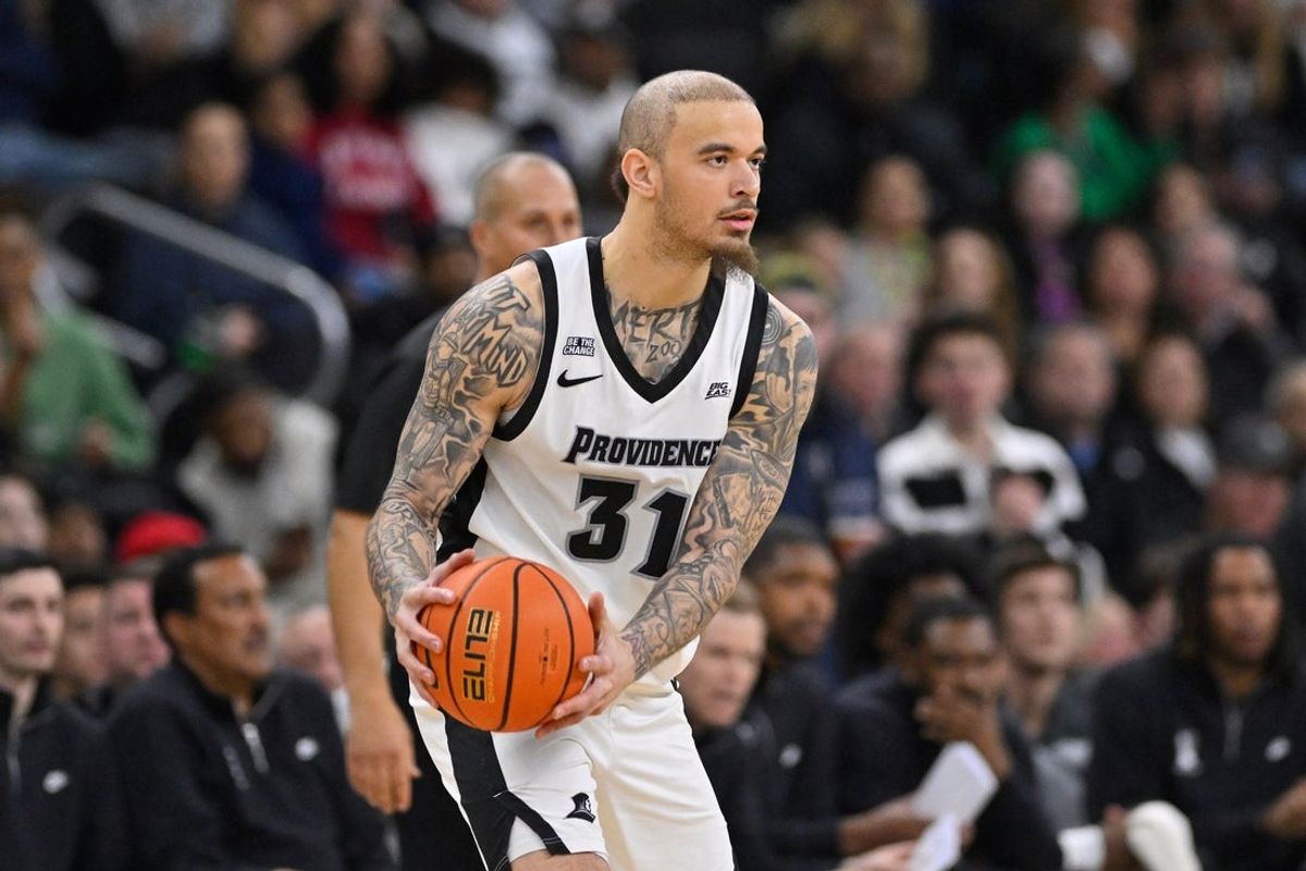 Jan 16, 2026; Providence, Rhode Island, USA; Providence Friars forward Duncan Powell (31) passes the ball during the second half against the Creighton Bluejays at Amica Mutual Pavilion. Mandatory Credit: Eric Canha-Imagn Images