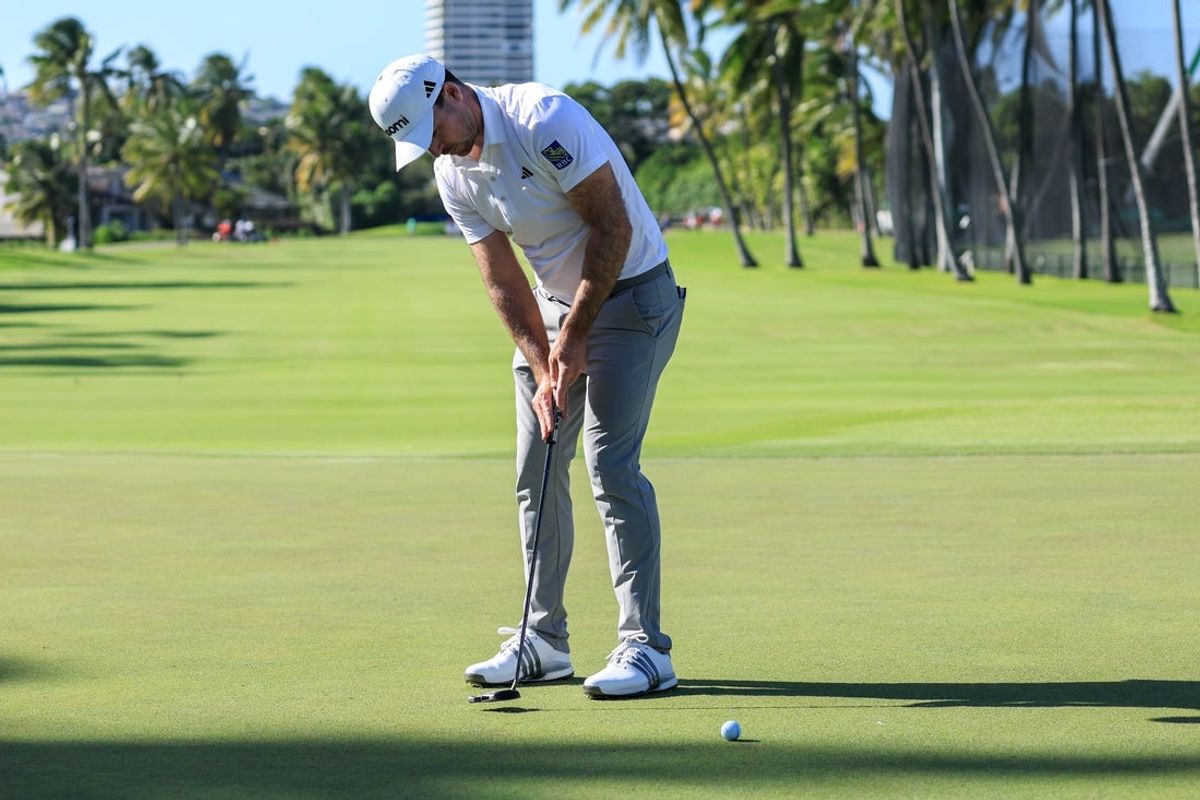 Jan 16, 2026; Honolulu, Hawaii, USA; Nick Taylor, of Canada, putts on the ninth green during the second round of the Sony Open in Hawaii. Mandatory Credit: Marco Garcia-Imagn Images