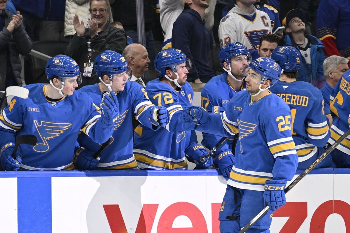 Jan 16, 2026; St. Louis, Missouri, USA; St. Louis Blues right wing Jordan Kyrou (25) is congratulated by teammates after scoring the game winging goal against the Tampa Bay Lightning in the shootout at Enterprise Center. Mandatory Credit: Jeff Le-Imagn Images