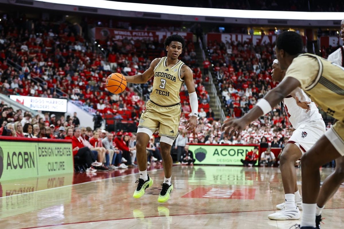 Jan 17, 2026; Raleigh, North Carolina, USA;  Georgia Tech Yellow Jackets guard Jaeden Mustaf (3) dribbles with the ball during the first half of the game against the NC State Wolfpack at Lenovo Center. Mandatory Credit: Jaylynn Nash-Imagn Images