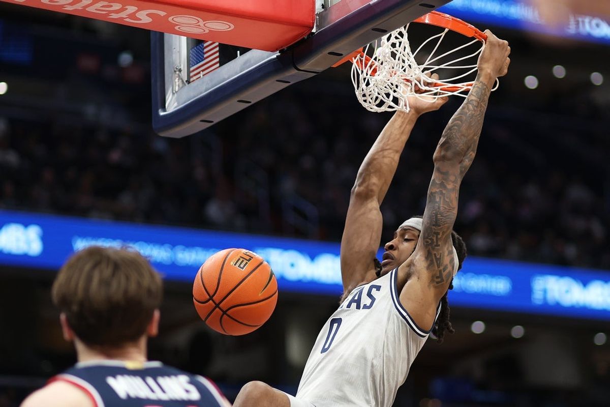 Jan 17, 2026; Washington, District of Columbia, USA; Georgetown Hoyas forward Jayden Fort (0) dunks during the first half against the UConn Huskies at Capital One Arena. Mandatory Credit: Daniel Kucin Jr.-Imagn Images