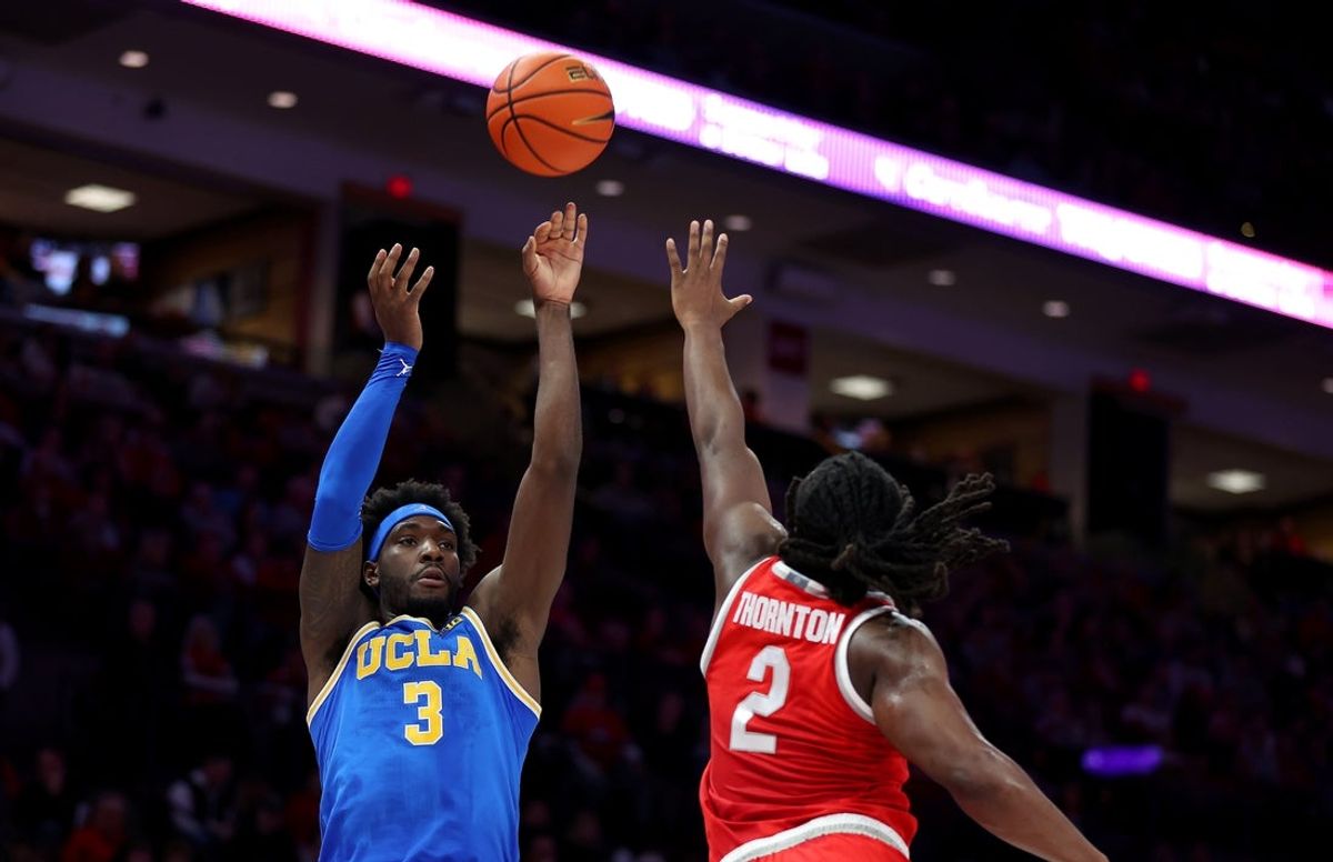 Jan 17, 2026; Columbus, Ohio, USA; UCLA Bruins forward Eric Dailey Jr. (3) shoots the ball as Ohio State Buckeyes guard Bruce Thornton (2) defends during the first half at Value City Arena. Mandatory Credit: Joseph Maiorana-Imagn Images