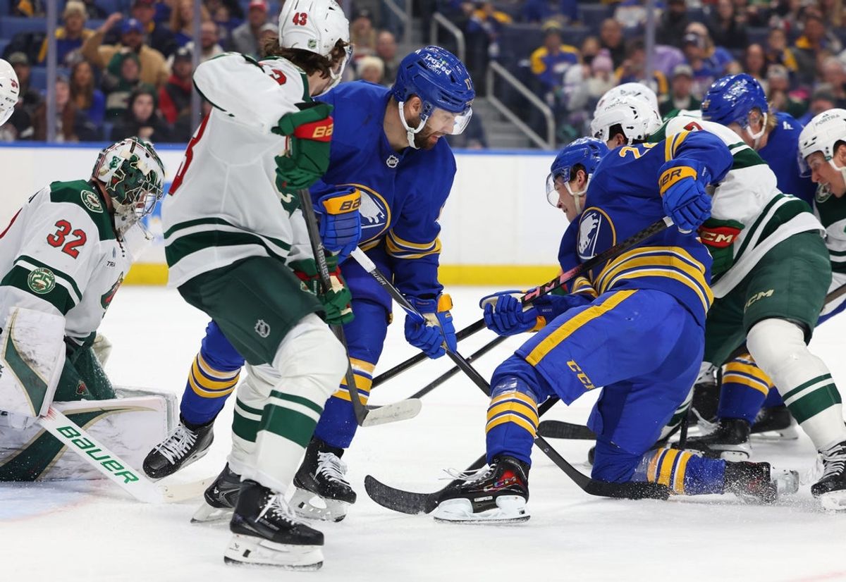 Jan 17, 2026; Buffalo, New York, USA;  Buffalo Sabres right wing Jack Quinn (22) scores a goal during the second period against the Minnesota Wild at KeyBank Center. Mandatory Credit: Timothy T. Ludwig-Imagn Images