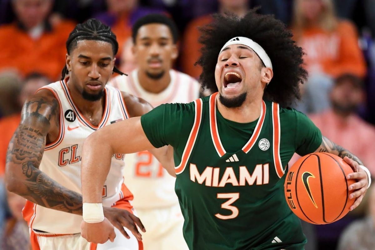 Clemson Tigers guard Dillon Hunter (2) defends Miami Hurricanes guard Tre Donaldson (3) Saturday, Jan. 17, 2026, during the NCAA men’s basketball game at Littlejohn Coliseum in Clemson, South Carolina.
