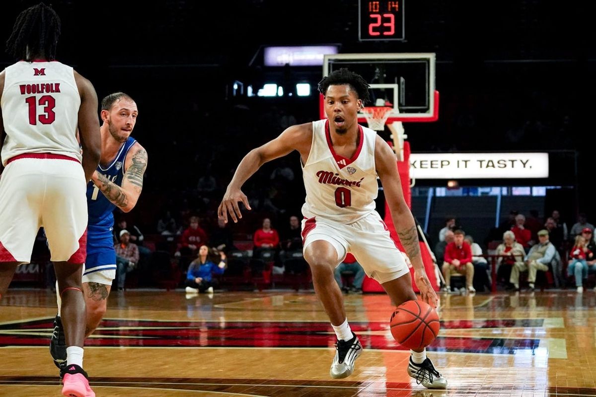 Miami (OH) RedHawks wing Eian Elmer (0) handles the ball in the first half of a NCAA men’s basketball game between the Miami RedHawks and Buffalo Bulls, Saturday, Jan. 17, 2026, at Millett Hall in Oxford, Oh.