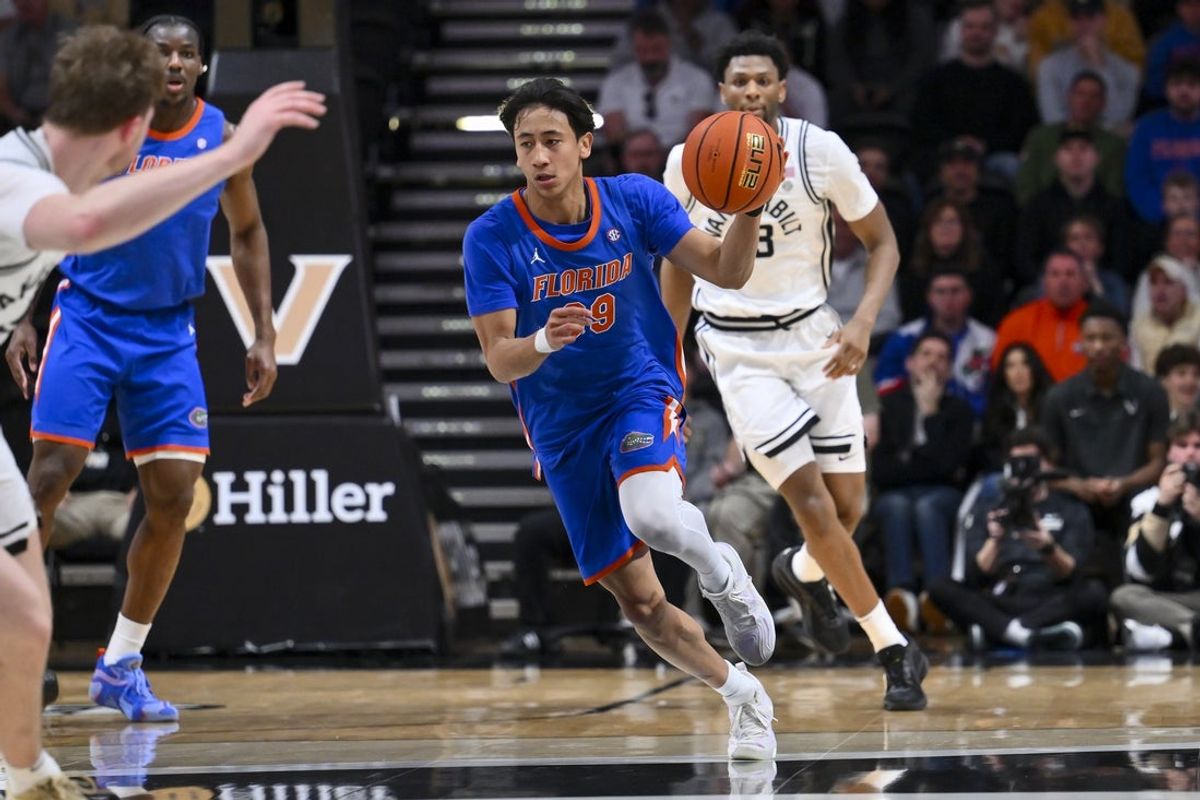 Jan 17, 2026; Nashville, Tennessee, USA;  Florida Gators guard Xaivian Lee (99) brings the ball up court against the Vanderbilt Commodores during the first half at Memorial Gymnasium. Mandatory Credit: Steve Roberts-Imagn Images