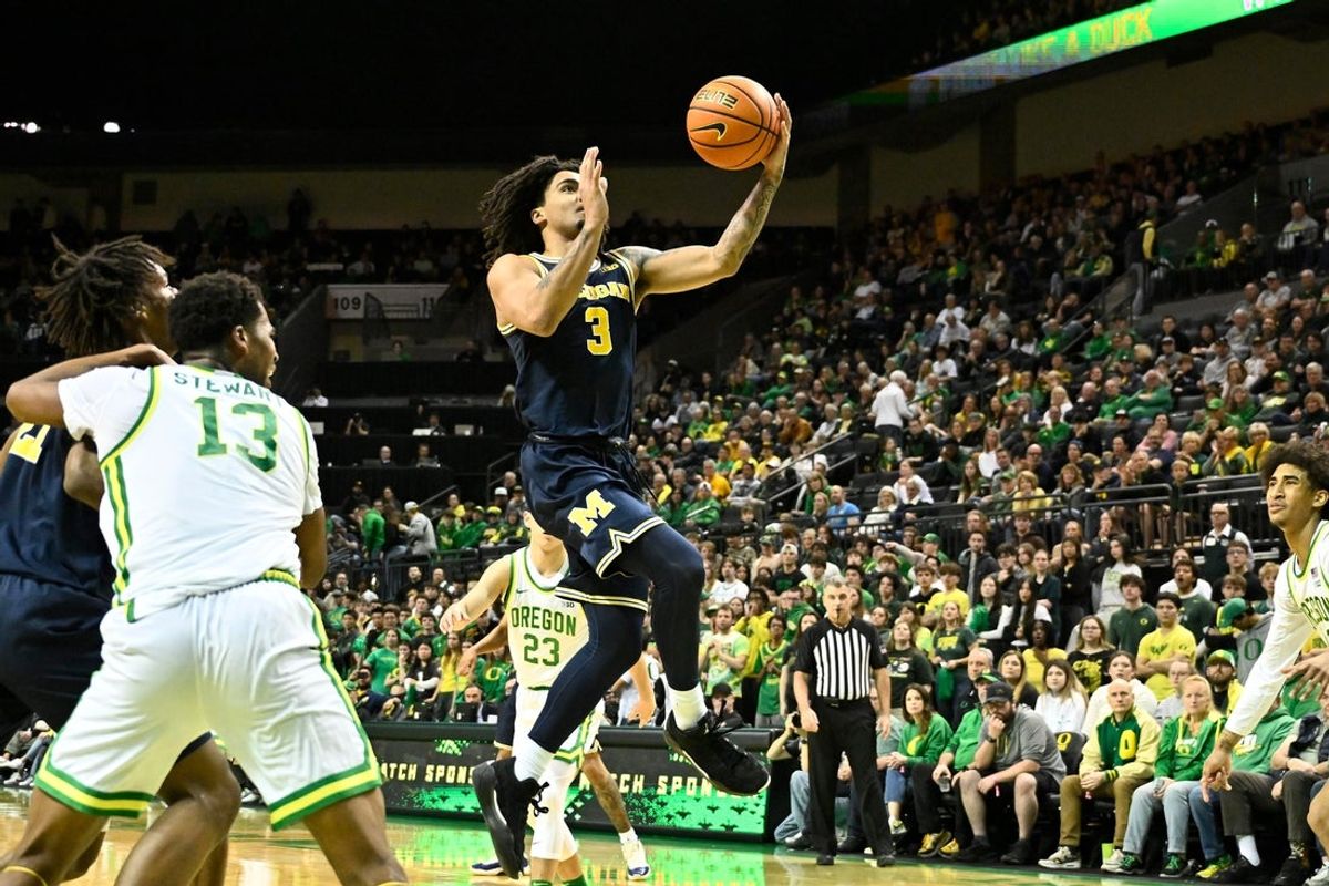 Jan 17, 2026; Eugene, Oregon, USA; Michigan Wolverines guard Elliot Cadeau (3) drives to the basket against the Oregon Ducks during the second half at Matthew Knight Arena. Mandatory Credit: Craig Strobeck-Imagn Images
