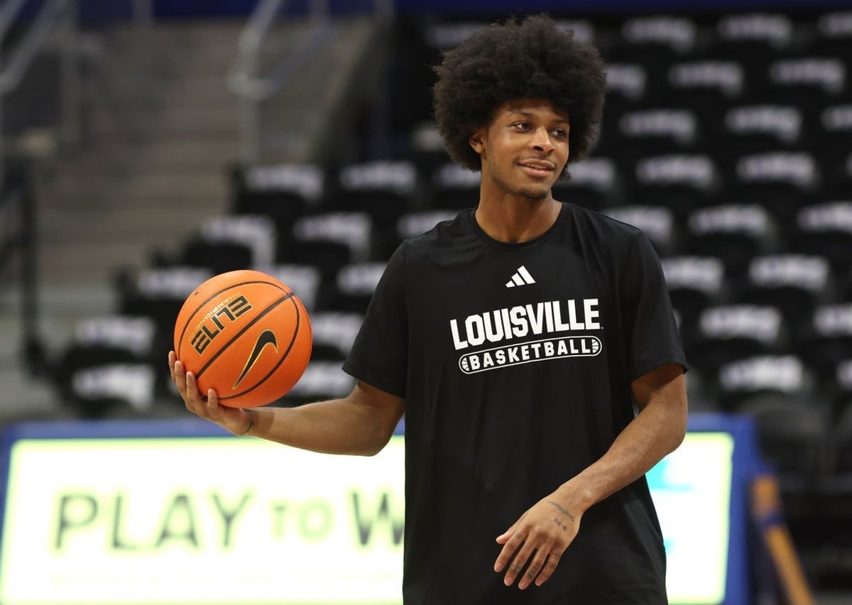 Jan 17, 2026; Pittsburgh, Pennsylvania, USA;  Louisville Cardinals guard London Johnson (5) warms up before the game against the Pittsburgh Panthers at the Petersen Events Center. Mandatory Credit: Charles LeClaire-Imagn Images
