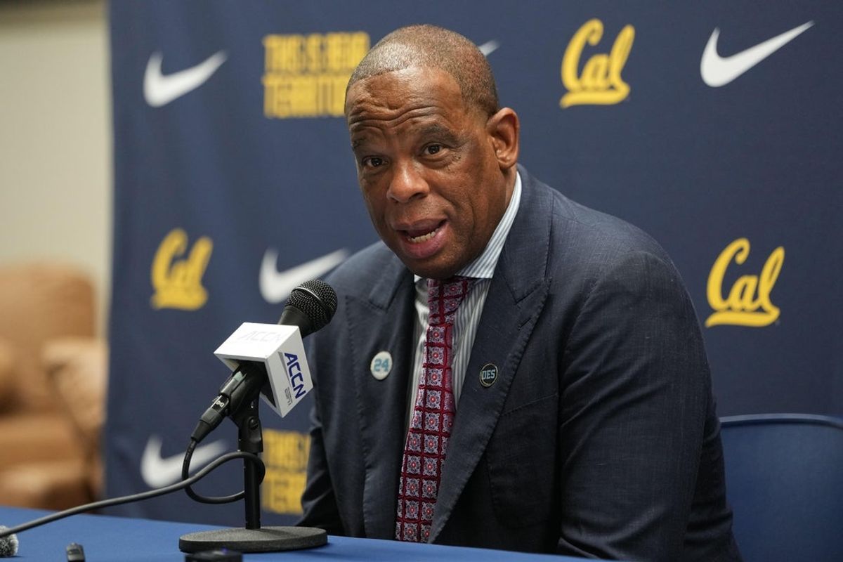 Jan 17, 2026; Berkeley, California, USA; North Carolina Tar Heels head coach Hubert Davis talks to media members after the game against the California Golden Bears at Haas Pavilion. Mandatory Credit: Darren Yamashita-Imagn Images
