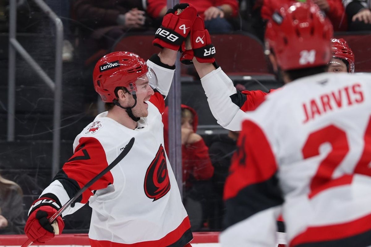 Jan 17, 2026; Newark, New Jersey, USA; Carolina Hurricanes right wing Andrei Svechnikov (37) celebrates his third goal of the game for a hat trick against the New Jersey Devils during the third period at Prudential Center. Mandatory Credit: Thomas Salus-Imagn Images