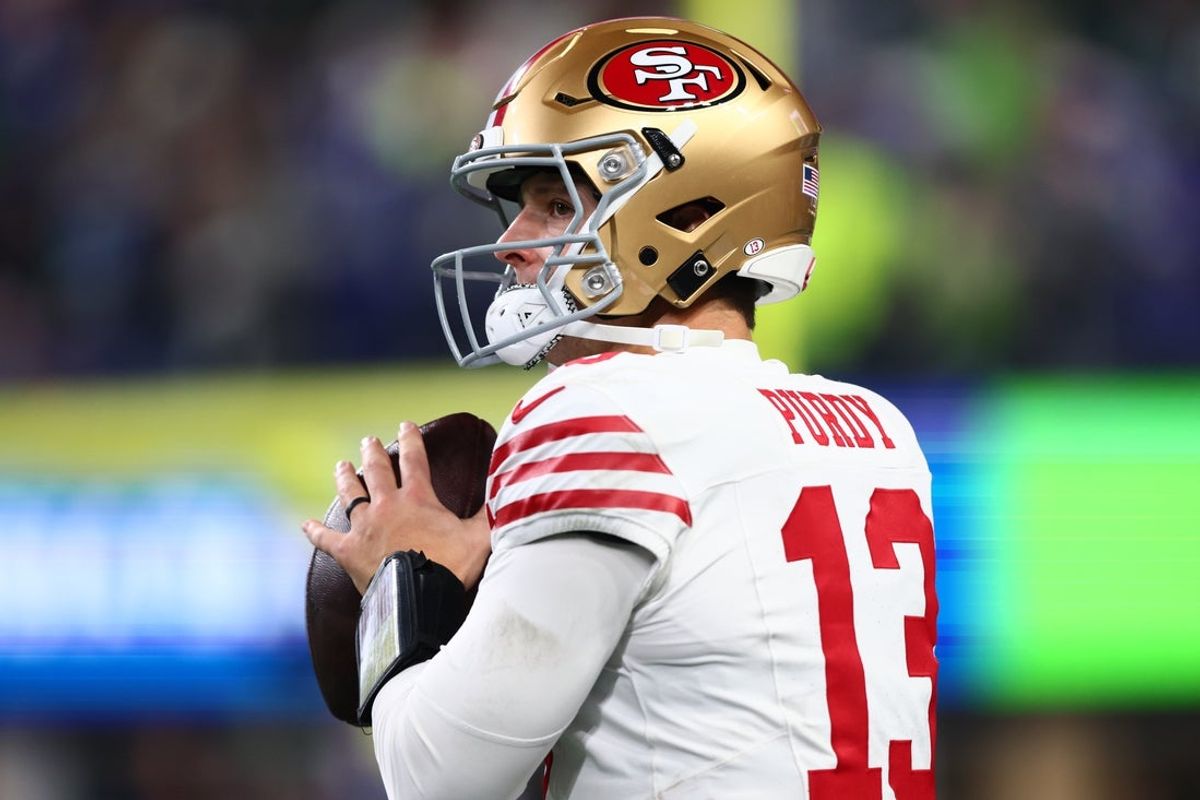 Jan 17, 2026; Seattle, WA, USA; San Francisco 49ers quarterback Brock Purdy (13) warms up before the start of the second half against the Seattle Seahawks in an NFC Divisional Round game at Lumen Field. Mandatory Credit: Kevin Ng-Imagn Images