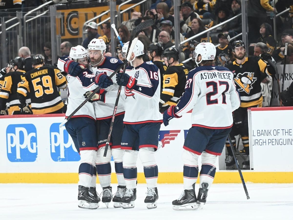 Jan 17, 2026; Pittsburgh, Pennsylvania, USA;  Columbus Blue Jackets right wing Charlie Coyle (3) celebrates his shoot out goal with defenseman Erik Gudbranson (44) and Brendan Gaunce (16) and left wing Zach Aston-Reese after scoring on Pittsburgh Penguins goalie Arturs Silovs (37) in a shoot out at PPG Paints Arena. Columbus won 4-3.  Mandatory Credit: Philip G. Pavely-Imagn Images