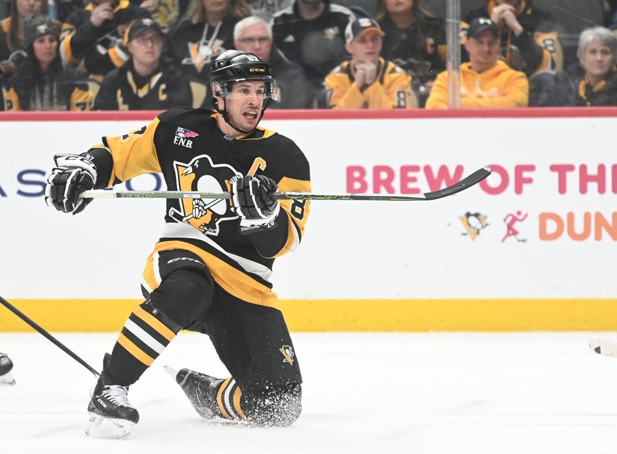 Jan 17, 2026; Pittsburgh, Pennsylvania, USA;  Pittsburgh Penguins center Sidney Crosby (87) takes a shot on the  Columbus Blue Jackets goalie during the third period at PPG Paints Arena. Columbus won 4-3 in a shoot out.  Mandatory Credit: Philip G. Pavely-Imagn Images