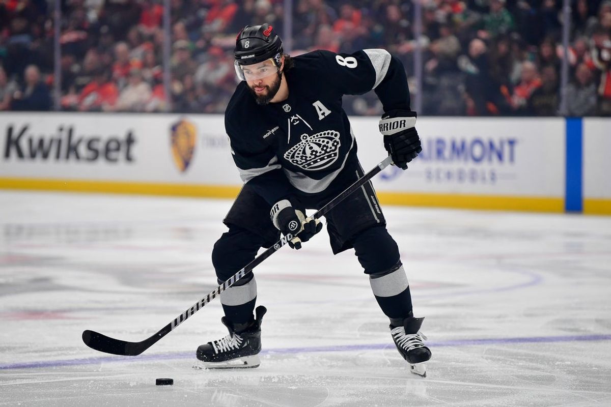 Jan 17, 2026; Anaheim, California, USA; Los Angeles Kings defenseman Drew Doughty (8) controls the puck against the Los Angeles Kings during the first period at Honda Center. Mandatory Credit: Gary A. Vasquez-Imagn Images