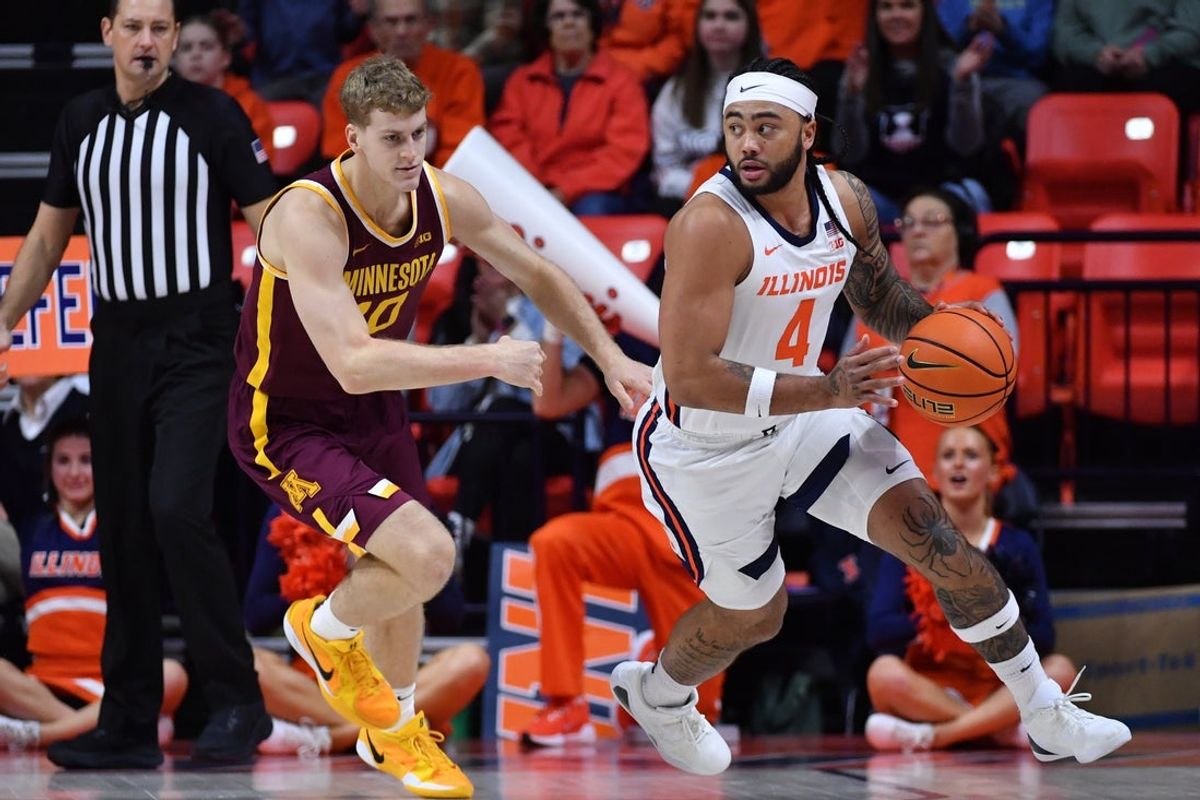 Jan 17, 2026; Champaign, Illinois, USA;  Illinois Fighting Illini guard Kylan Boswell (4) is pursued by Minnesota Golden Gophers guard Cade Tyson (10) as he brings the ball up court during the first half at State Farm Center. Mandatory Credit: Ron Johnson-Imagn Images