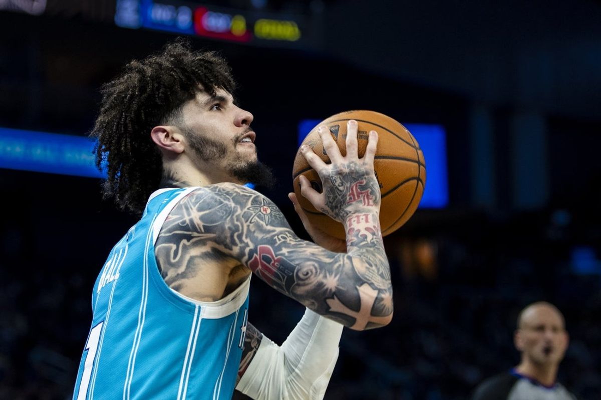 Jan 17, 2026; San Francisco, California, USA; Charlotte Hornets guard LaMelo Ball (1) takes a three-point shot against the Golden State Warriors during the fourth quarter at Chase Center. Mandatory Credit: John Hefti-Imagn Images