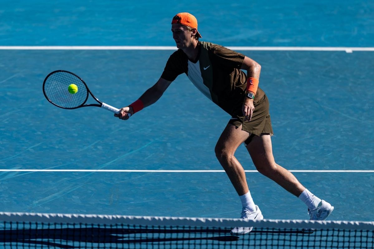 Jan 18, 2026; Melbourne, Victoria, Australia; Sebastian Korda of United States in action against Michael Zheng of United States in the first round of the men’s singles at the Australian Open at Kia Arena in Melbourne Park. Mandatory Credit: Mike Frey-Imagn Images