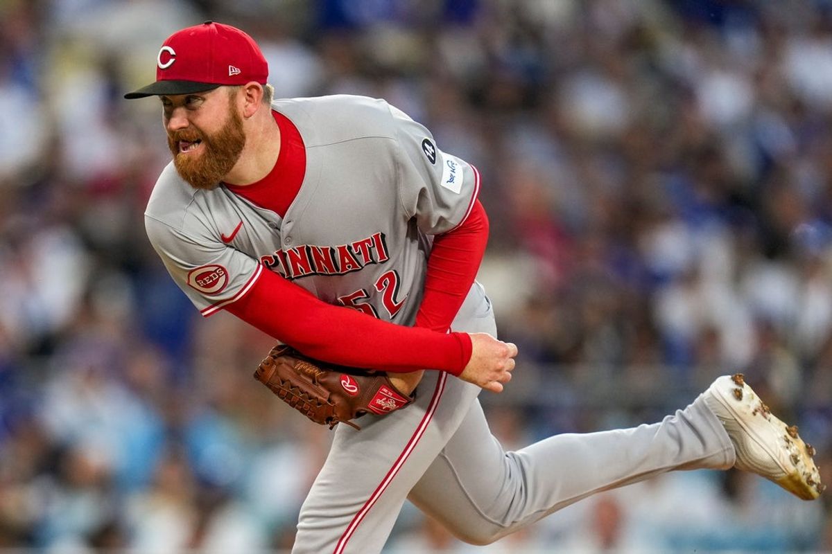 Cincinnati Reds starting pitcher Zack Littell throws a pitch in the first inning of Game 2 in the wild-card series against the Los Angeles Dodgers at Dodger Stadium in Los Angeles on Wednesday, Oct. 1, 2025. The Reds were eliminated from the postseason with an 8-4 loss.