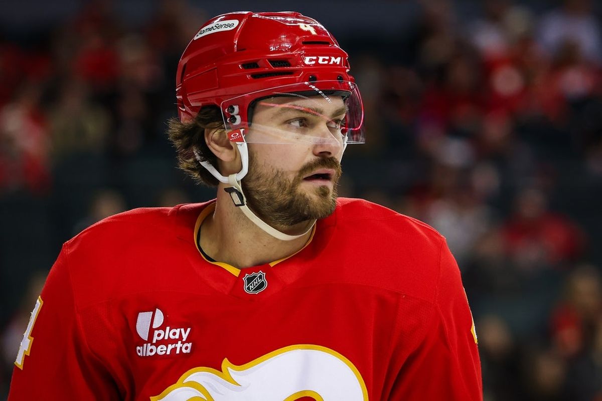 Jan 17, 2026; Calgary, Alberta, CAN; Calgary Flames defenseman Rasmus Andersson (4) against the New York Islanders during the third period at Scotiabank Saddledome. Mandatory Credit: Sergei Belski-Imagn Images