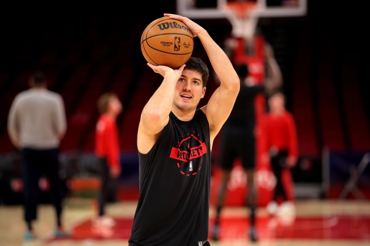 Jan 18, 2026; Houston, Texas, USA; Houston Rockets guard Reed Sheppard (15) warms up prior to the game against the New Orleans Pelicans at Toyota Center. Mandatory Credit: Erik Williams-Imagn Images