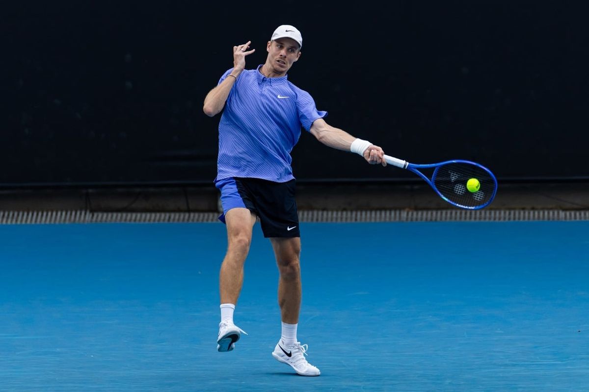 Jan 19, 2026; Melbourne, Victoria, Australia; Denis Shapovalov of Canada in action against Yunchaokete Bu of China in the first round of the men’s singles at the Australian Open at ANZ Arena in Melbourne Park. Mandatory Credit: Mike Frey-Imagn Images