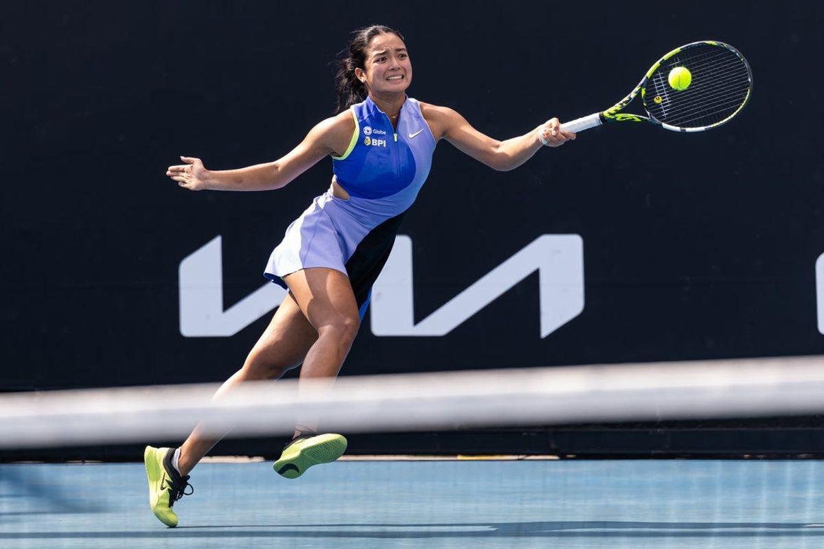 Jan 19, 2026; Melbourne, Victoria, Australia; Alexandra Eala of Philippines in action against Alycia Parks of United States in the first round of the women’s singles at the Australian Open at Melbourne Park. Mandatory Credit: Mike Frey-Imagn Images