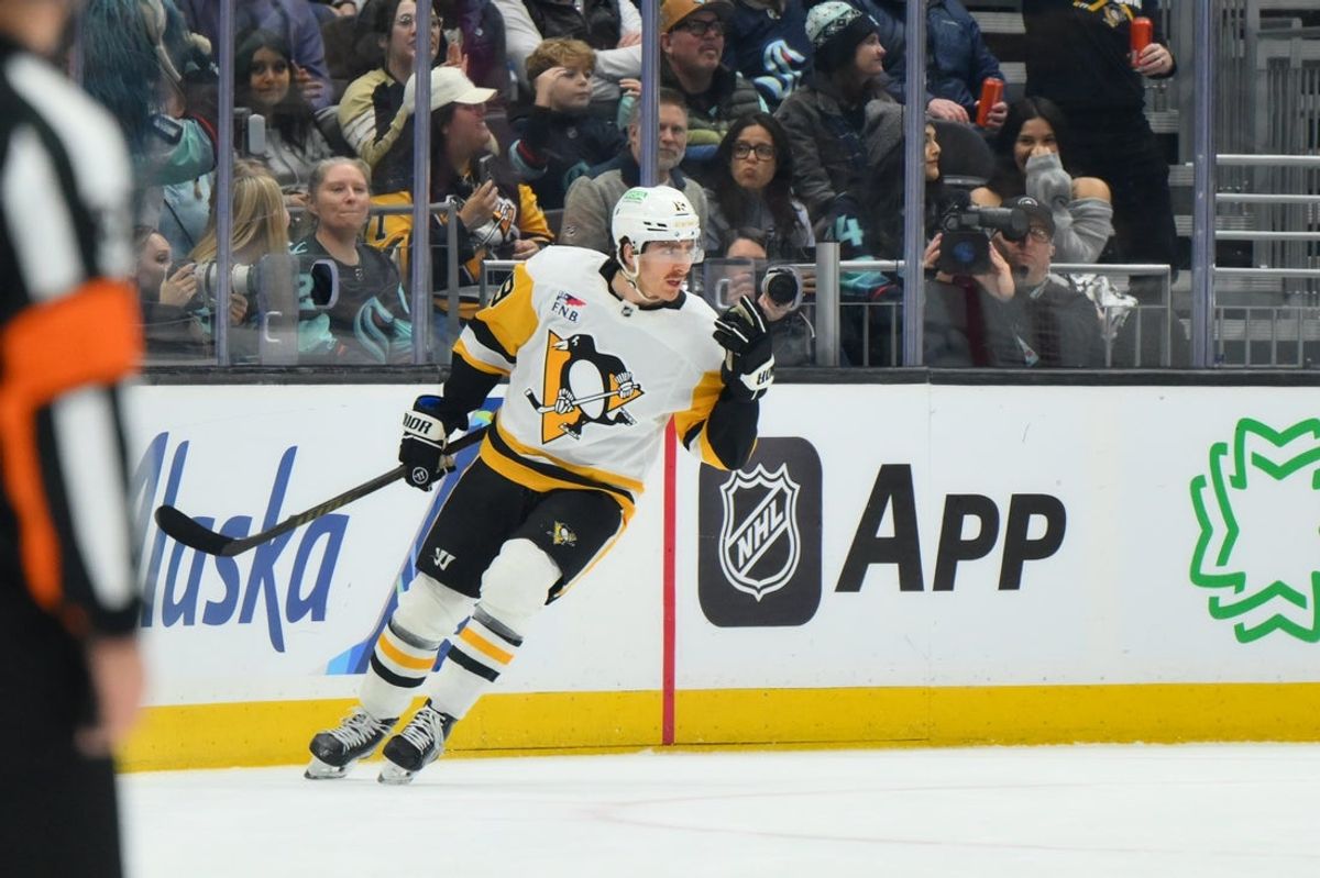 Jan 19, 2026; Seattle, Washington, USA; Pittsburgh Penguins center Connor Dewar (19) celebrates after scoring a goal against the Seattle Kraken during the first period at Climate Pledge Arena. Mandatory Credit: Steven Bisig-Imagn Images