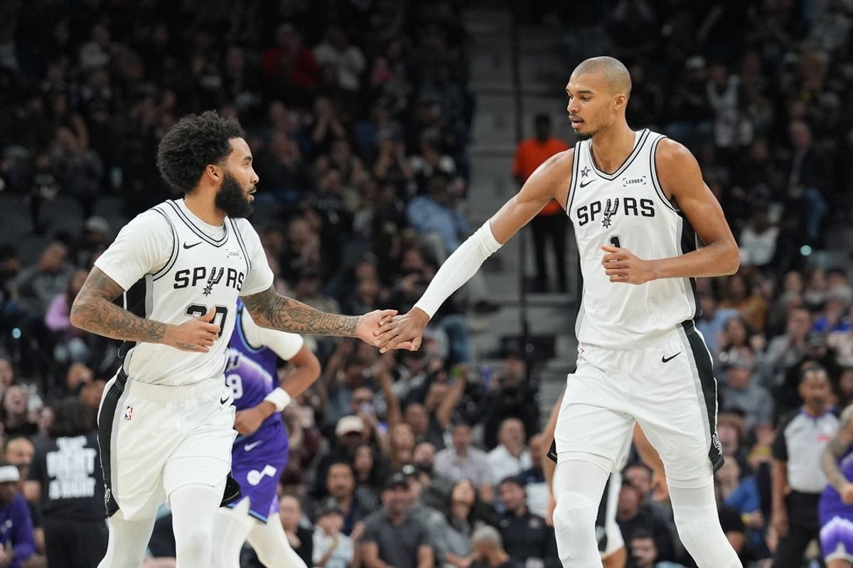 Jan 19, 2026; San Antonio, Texas, USA;  San Antonio Spurs forward Julian Champagnie (30) and San Antonio Spurs forward Victor Wembanyama (1) in the first half against the Utah Jazz at Frost Bank Center. Mandatory Credit: Daniel Dunn-Imagn Images
