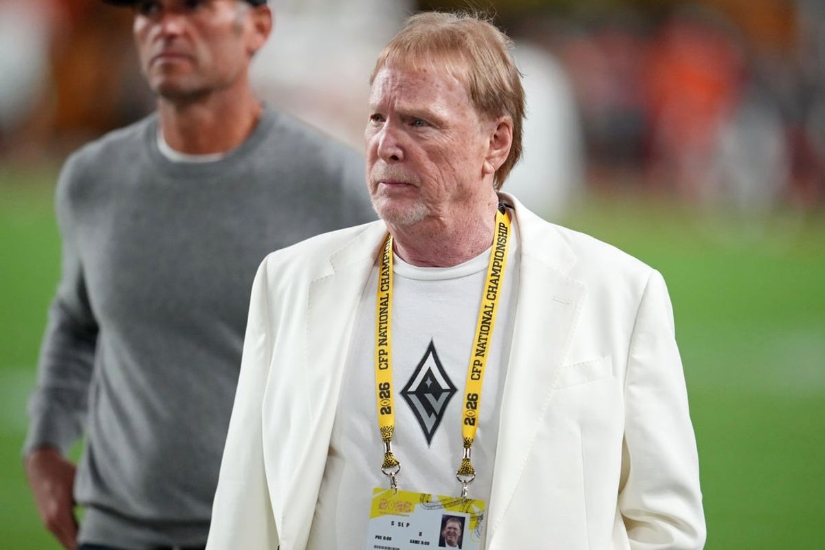 Jan 19, 2026; Miami Gardens, FL, USA; Las Vegas Raiders owner Mark Davis walks on the field before the CFP National Championship college football game between the Indiana Hoosiers and the Miami Hurricanes at Hard Rock Stadium. Mandatory Credit: Kirby Lee-Imagn Images