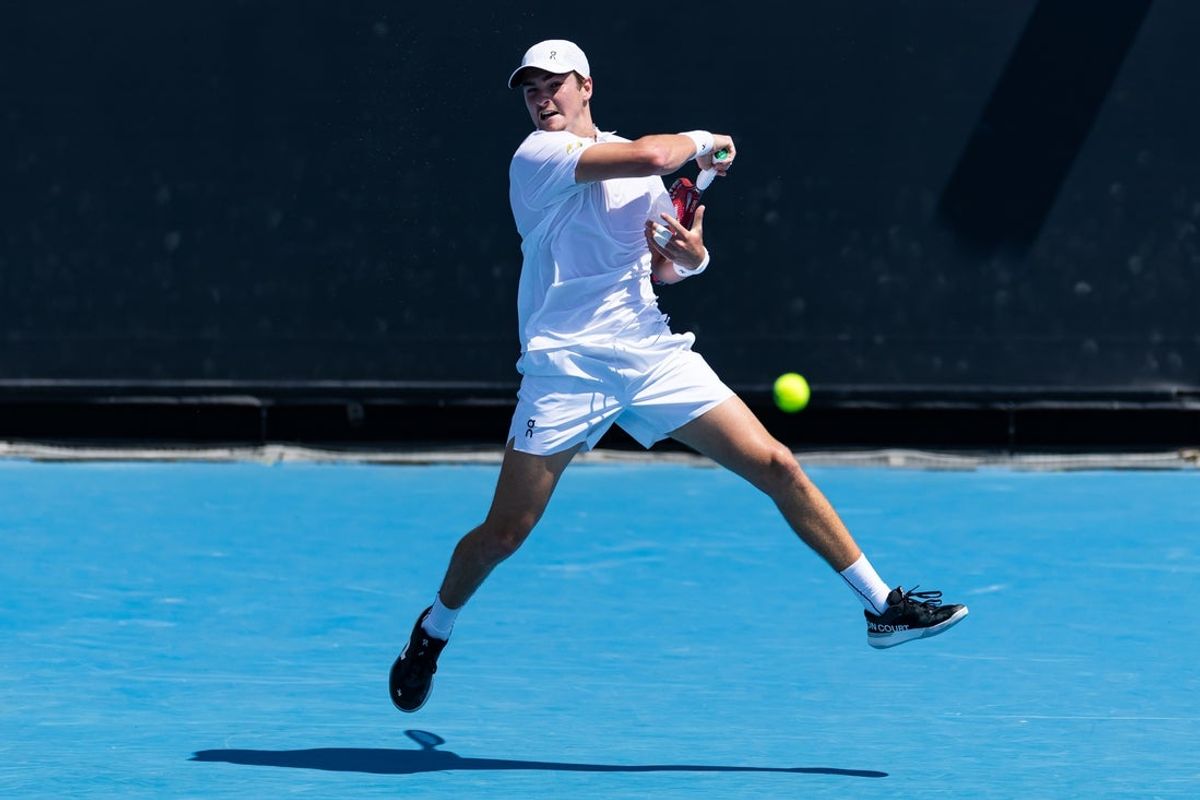 Jan 20, 2026; Melbourne, Victoria, Australia; Joao Fonseca of Brazil in action against Eliot Spizzirri of United States in the first round of the menís singles at the Australian Open at 1573 Arena in Melbourne Park. Mandatory Credit: Mike Frey-Imagn Images