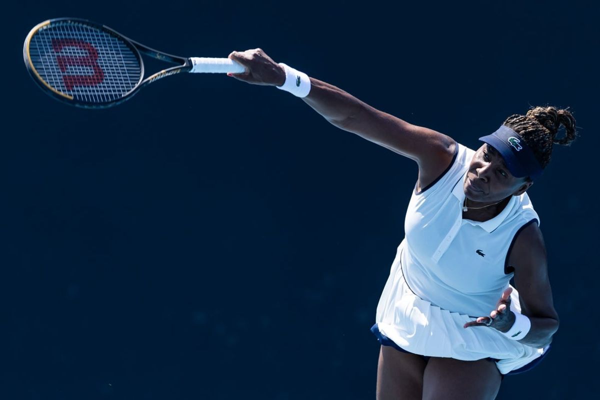 Jan 20, 2026; Melbourne, Victoria, Australia; Venus Williams of United States and Ekaterina Alexandrova in action against Emiliana Arango of Colombia and Elsa Jacquemot of France in the first round of the womenís doubles at the Australian Open at Melbourne Park. Mandatory Credit: Mike Frey-Imagn Images
