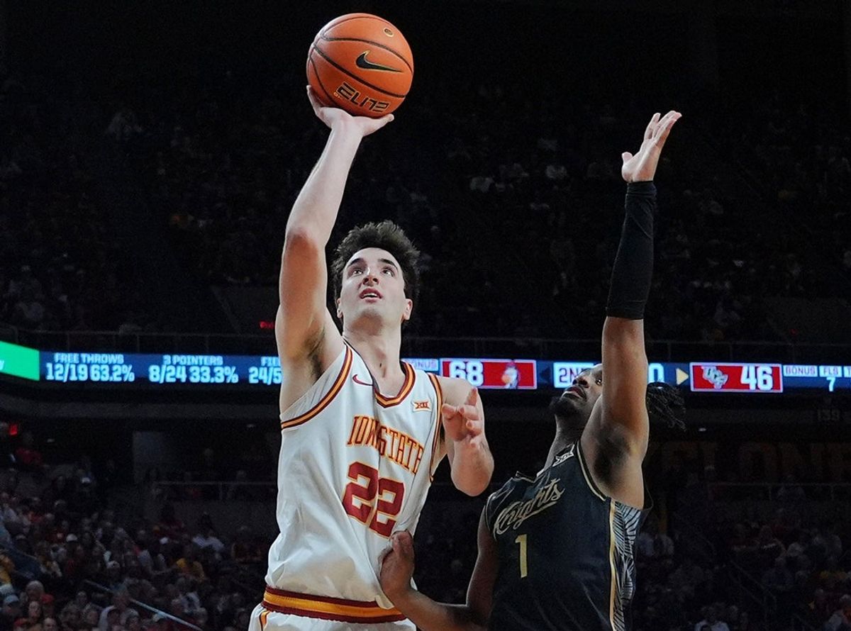 Iowa State Cyclones forward Milan Momcilovic (22) shoots the ball over over UCF Knights guard Themus Fulks (1) during the second half in the Big-12 conference men’s basketball on Jan. 20, 2026, at Hilton Coliseum in Ames, Iowa.