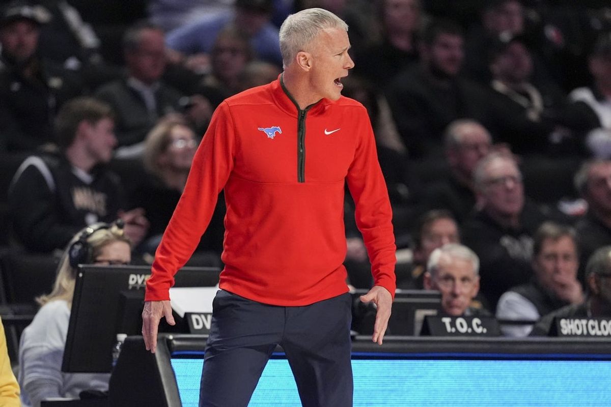 Jan 20, 2026; Winston-Salem, North Carolina, USA; Southern Methodist University Mustangs head coach Andy Enfield reacts to a call during the first half against the Wake Forest Demon Deacons at Lawrence Joel Veterans Memorial Coliseum. Mandatory Credit: Jim Dedmon-Imagn Images
