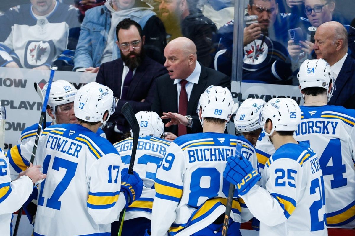 Jan 20, 2026; Winnipeg, Manitoba, CAN; St. Louis Blues coach Jim Montgomery strategizes against the Winnipeg Jets during the third period at Canada Life Centre. Mandatory Credit: Terrence Lee-Imagn Images