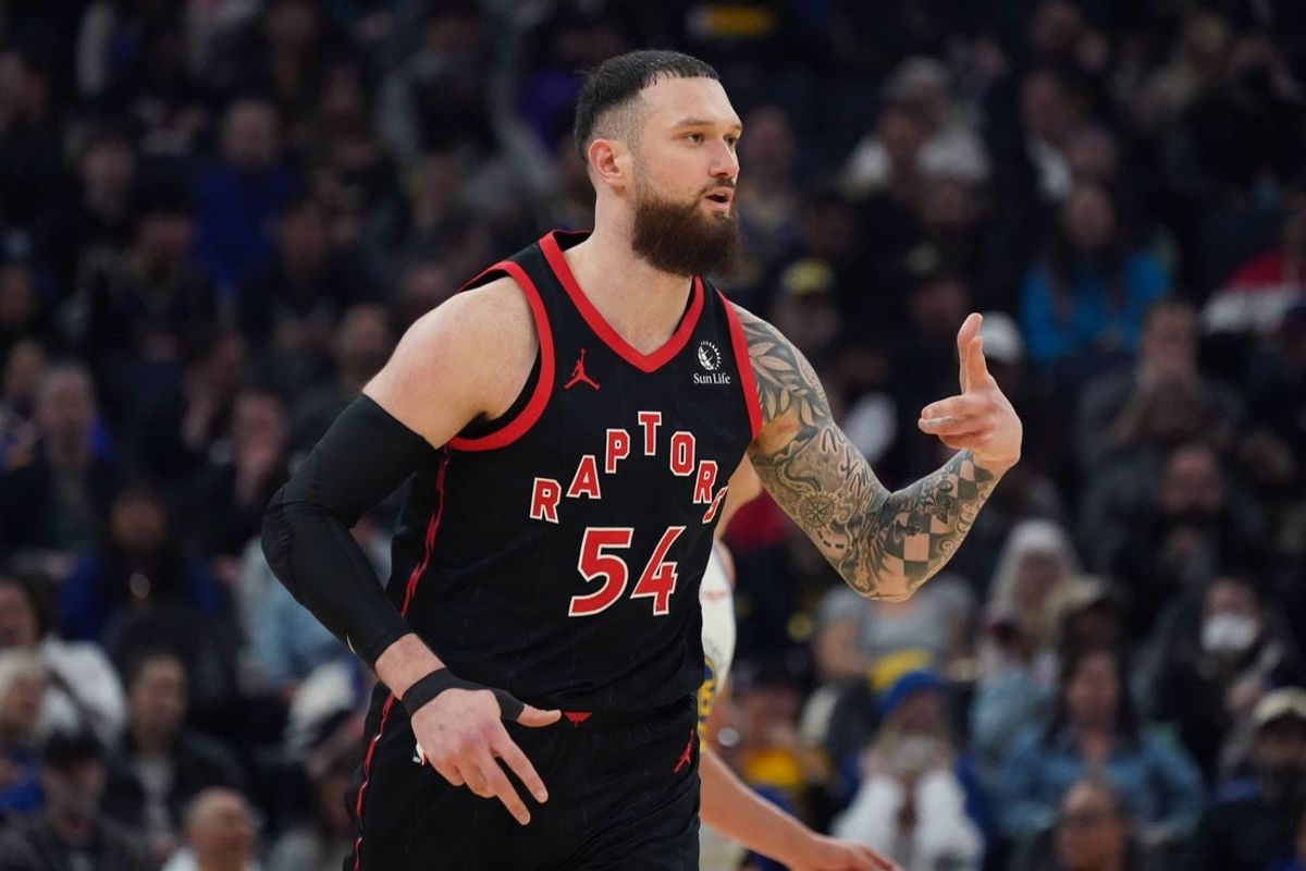 Jan 20, 2026; San Francisco, California, USA;  Toronto Raptors forward/center Sandro Mamukelashvili (54) motions to the bench after hitting a three-pointer against the Golden State Warriors in the second quarter at Chase Center. Mandatory Credit: David Gonzales-Imagn Images
