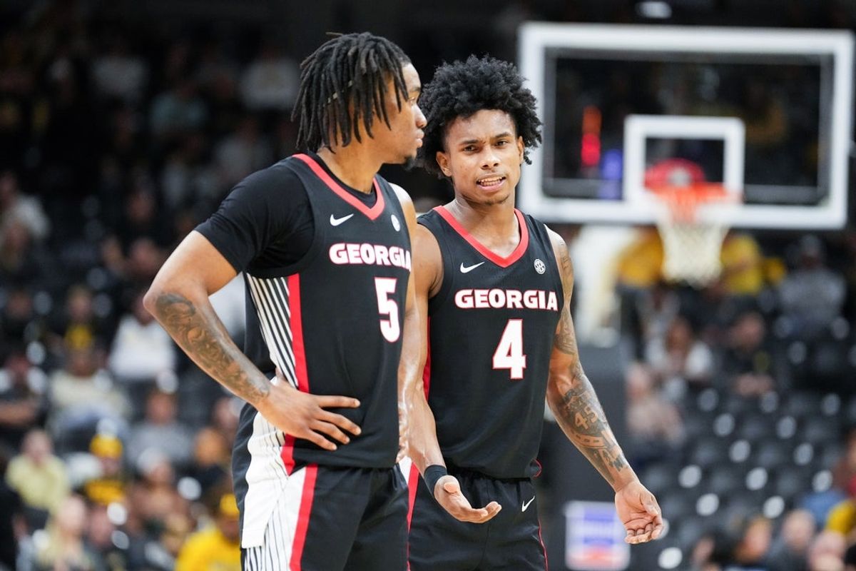 Jan 20, 2026; Columbia, Missouri, USA; Georgia Bulldogs guard Jeremiah Wilkinson (5) talks with guard Marcus Millender (4) against the Missouri Tigers during the second half of the game at Mizzou Arena. Mandatory Credit: Denny Medley-Imagn Images