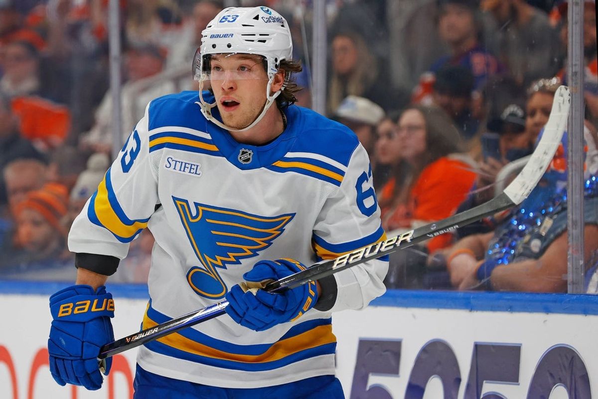 Jan 18, 2026; Edmonton, Alberta, CAN; St. Louis Blues forward Jake Neighbours (63) follows the play against the Edmonton Oilers at Rogers Place. Mandatory Credit: Perry Nelson-Imagn Images